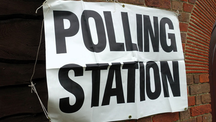 Polling Station sign on building.jpg