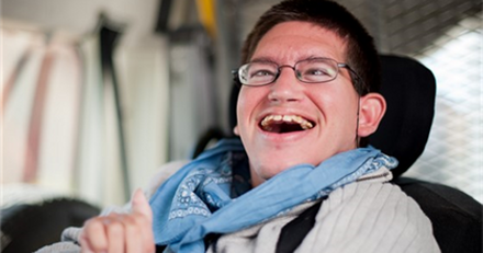Disabled man smiling.png